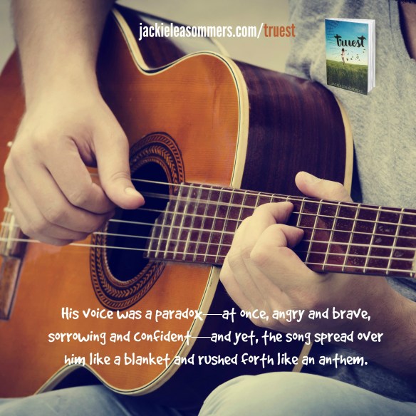 man plays the guitar on the street. retro style.